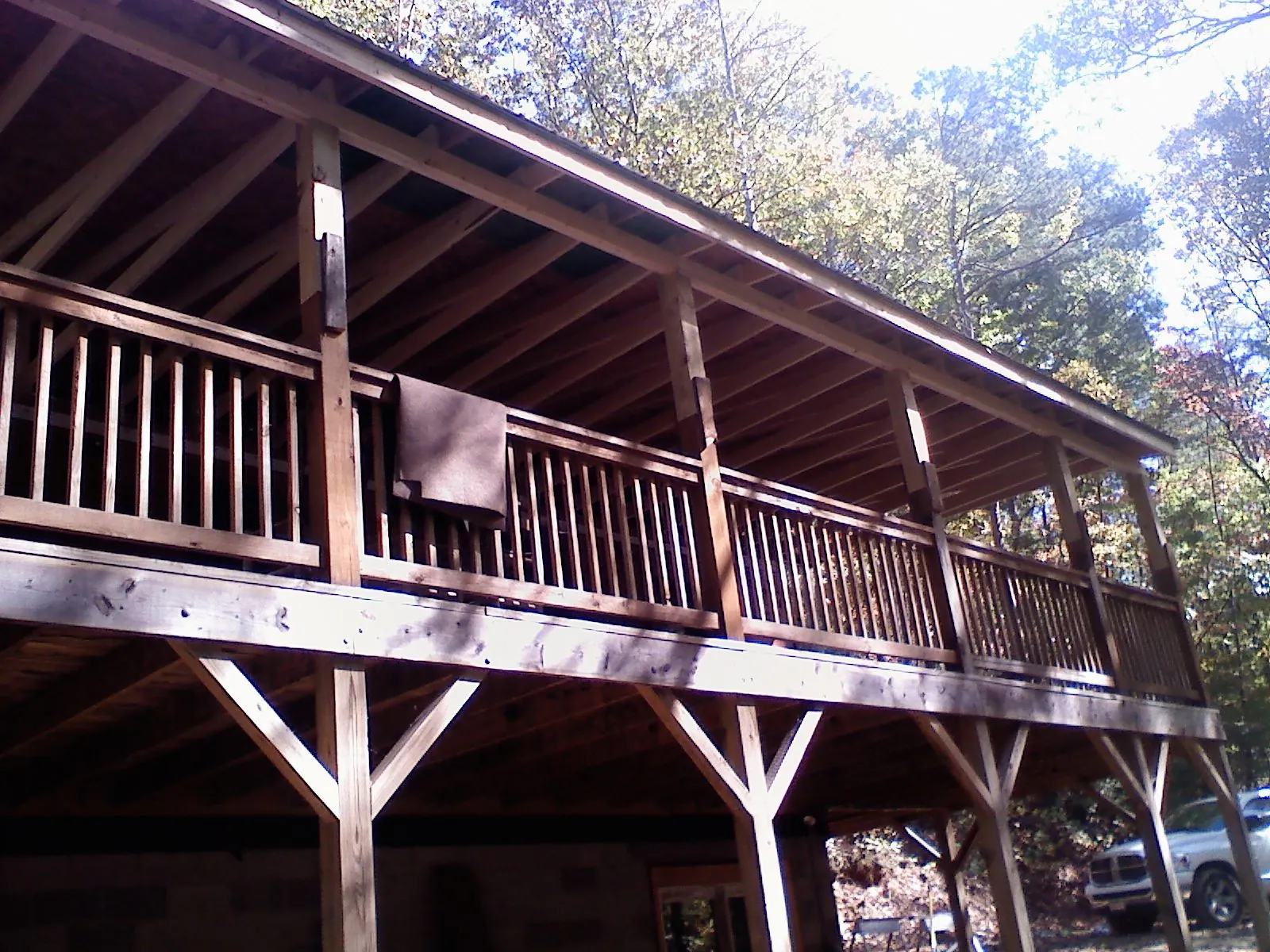 Timber framing under a new elevated porch and deck — Roof Leak Repair in San Dimas by Roofing Brothers